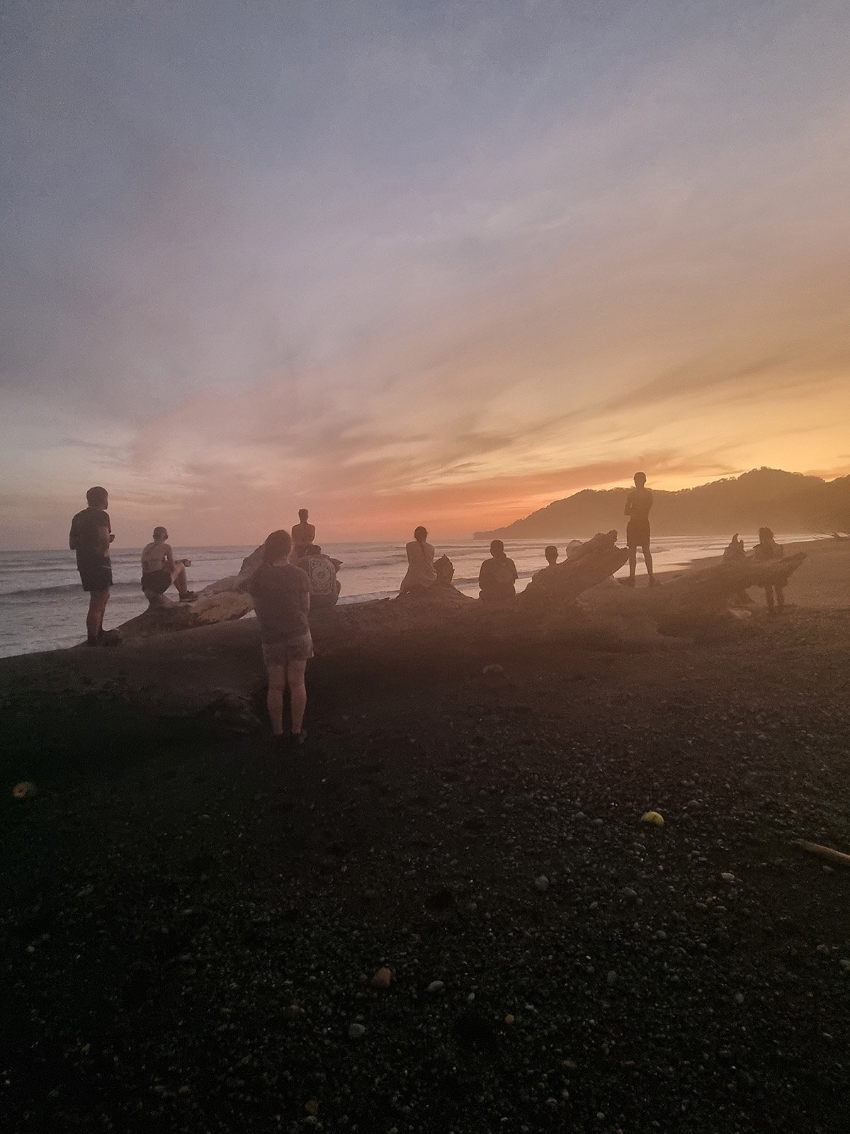 Students on beach in Costa Rica waiting for sea turtles