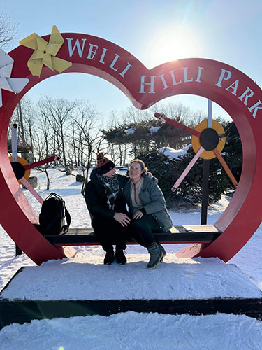 Belinda in front of a heart at the Welli Hilli Park