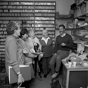black and white photo of Lady Vera White with a group of Deakin professionals