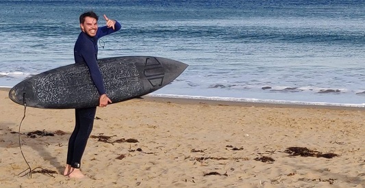 Surf's up as Deakin trio launch world-first recycled carbon surfboards