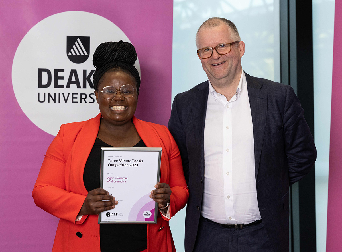 Deakin 2023 3MT Winner Agnes Ruramai Mukurumbira with Deakin Vice Chancellor Iain Martin