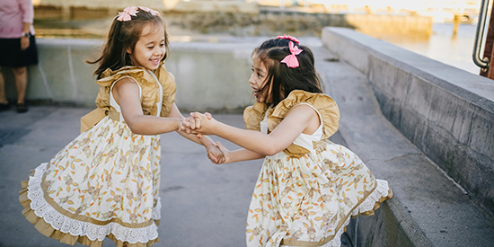 Young twins playing together