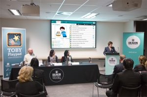 Deakin's Vice-Chancellor Professor Jane den Hollander (far right) introduces the TOBY Playpad.