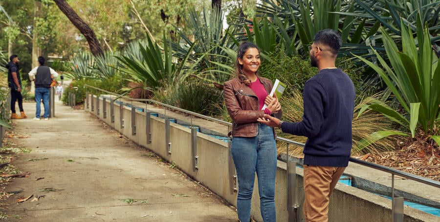 Students chatting in the gardens at Deakin's Waurn Ponds Campus