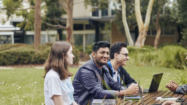 International students chatting on campus