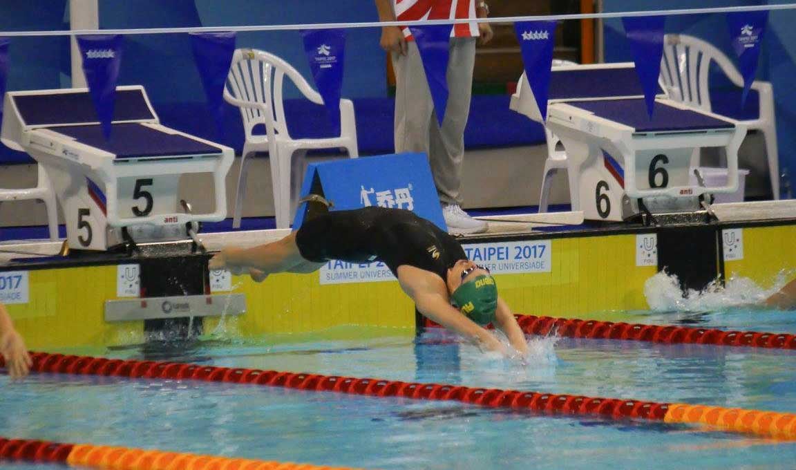 Image of Sian diving into pool