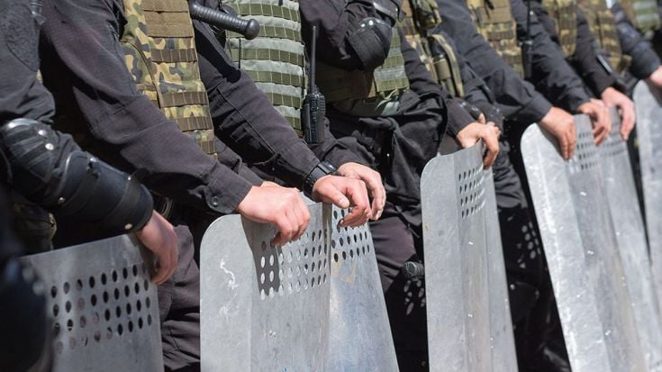 Soldiers with riot guards