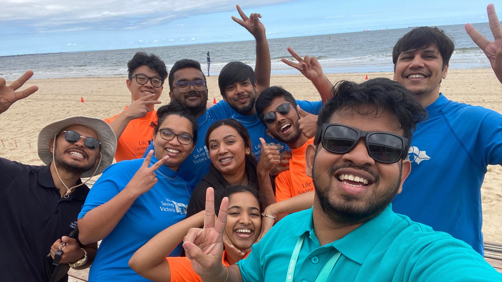 Group of international students at beach