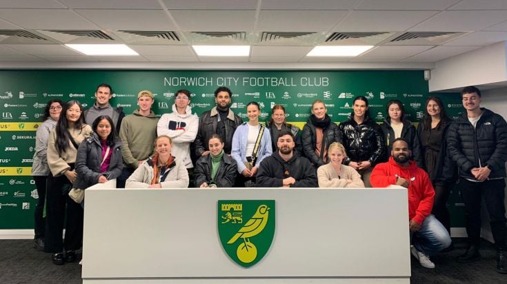 A group of students at the Norwich City Football Club