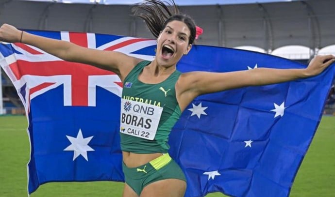 Image of Tiana Boras holding the Australian flag