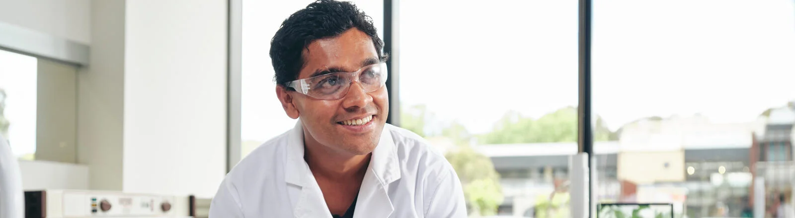 A Deakin Master of Biotechnology student in a lab.