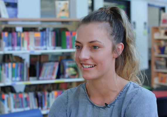 Tayla at Primary School talking to camera.