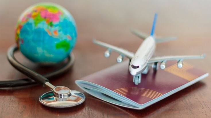 Pic of plane, passport and stethoscope