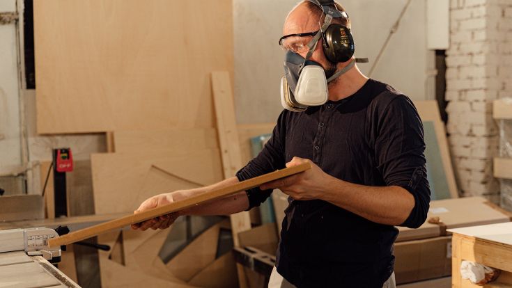 Student in workshop with safety gear on