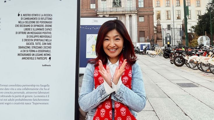 Student Jun in front of a building in Milan