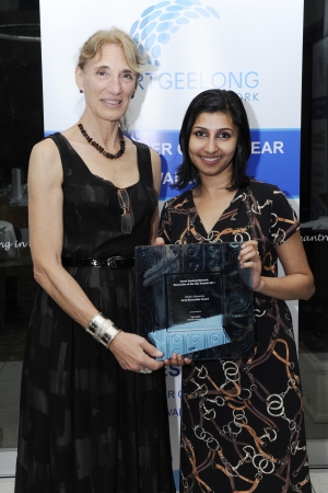 Nisa Salim receives her award from Professor Lee Astheimer, Deputy Vice-Chancellor (Research. Deakin University sponsors the Early Career Researcher award.