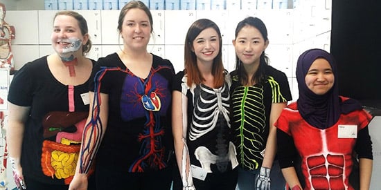 Painting their fingers to the bone at Open Day