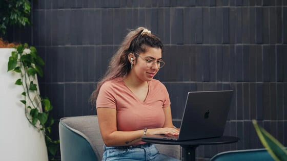 Deakin master of psychology (clinical) student studies on campus.