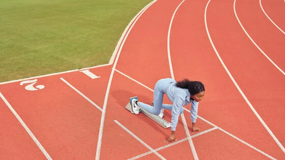 A Deakin bachelor of exercise student ready to run on a track.