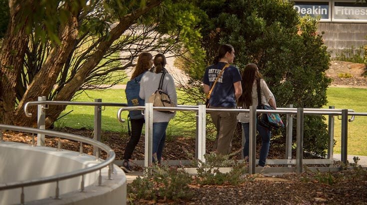 Students walking outside at Warrnambool campus