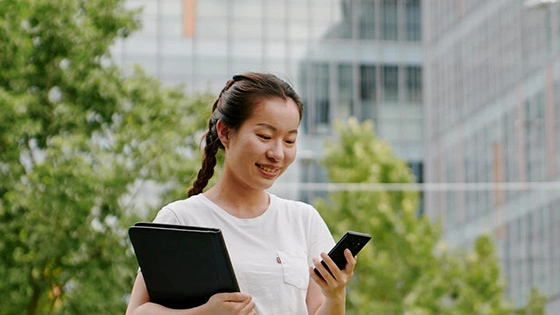 A student smiles while studying