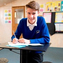 Student Angus Price working on the Sit Stand desks during the Up and Learn study at Thornbury High School.