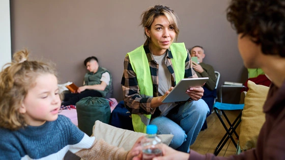 Volunteers helping people in need