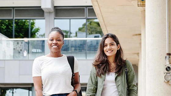 Two Deakin students walking to class