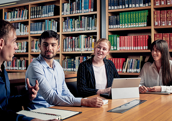 A student in the Deakin law library