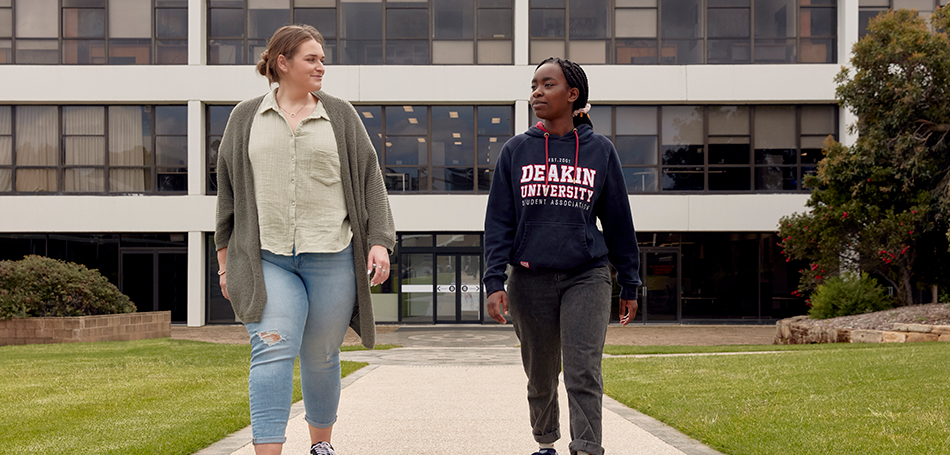 Two students walking and talking
