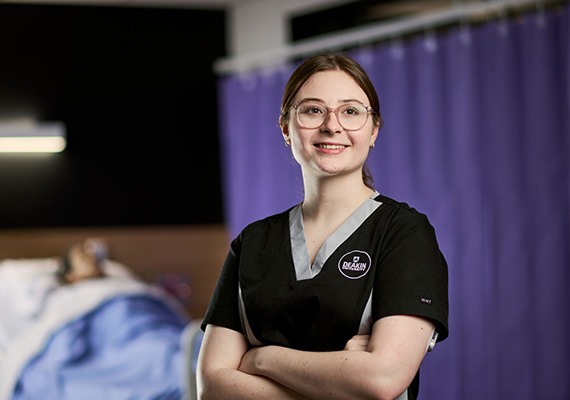 Headshot of Bachelor of Nursing student Beth Lightbody in a simulation lab.