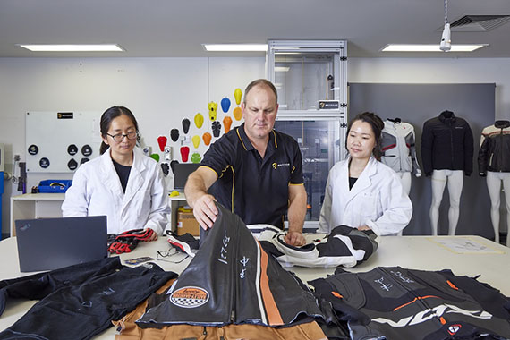 Associate Professor Chris Hurren and his team testing motorcycle gear in the lab at IFM