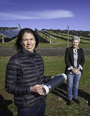 A Deakin researcher and industry partner in the Deakin solar farm