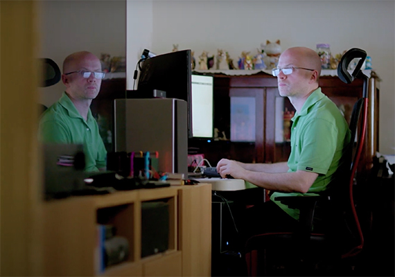Man studying engineering in the comfort of his own home