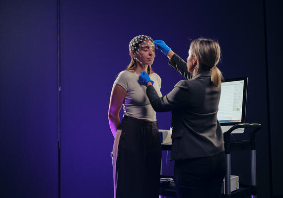 A Deakin neuroscience student uses brain scan equipment 
