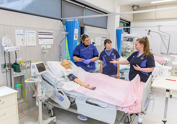 Deakin students working in nursing simulation labs.