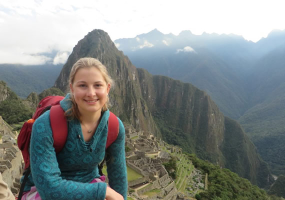 Deakin student Maddi Moore on a hike with mountains in the background.