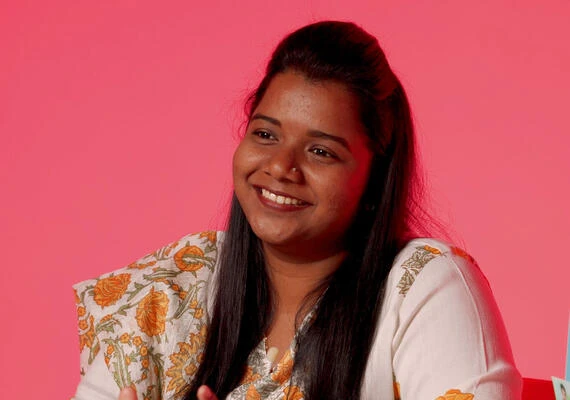 Student smiling at camera