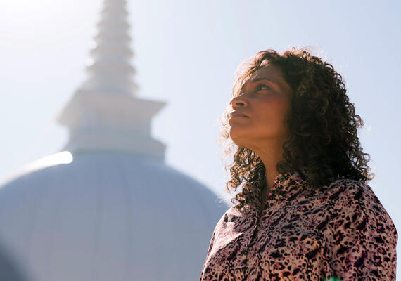 Mesha Tennakoon in front of stupa