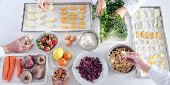 Food is layed out on a table. Study food, nutrition and dietetics in Deakin's dietician course to gain sought-after knowledge.
