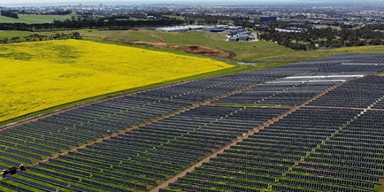 Aerial view of Deakin solar farm microgrid in open fields.