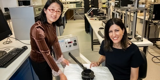 (L-R) Assoc Research Fellow Dr Zengxiao Cai and Dr Maryam Naebe in the Deakin IFM labs with their wool insulator material.