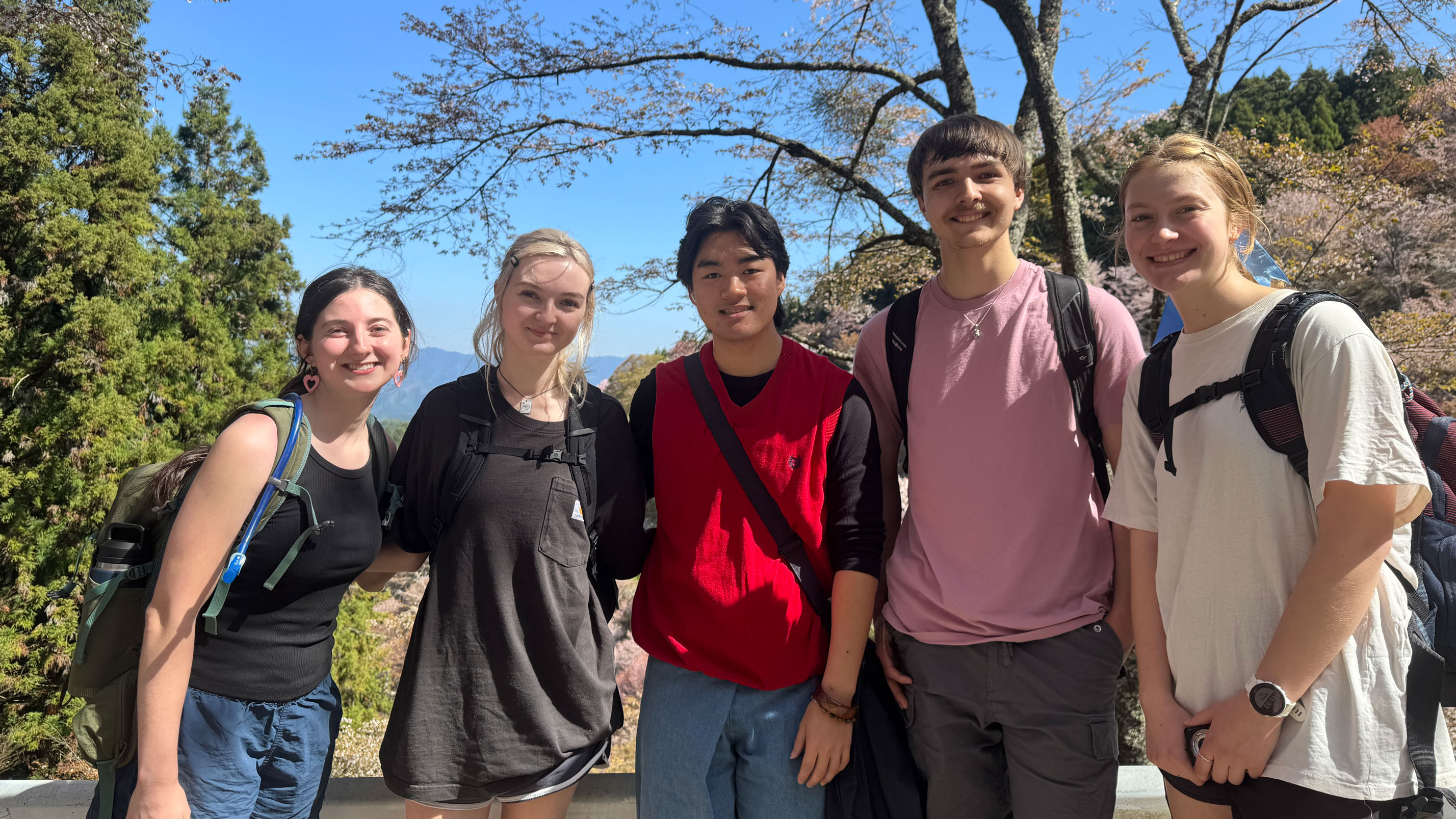 Student Thea walking with friends in Japan