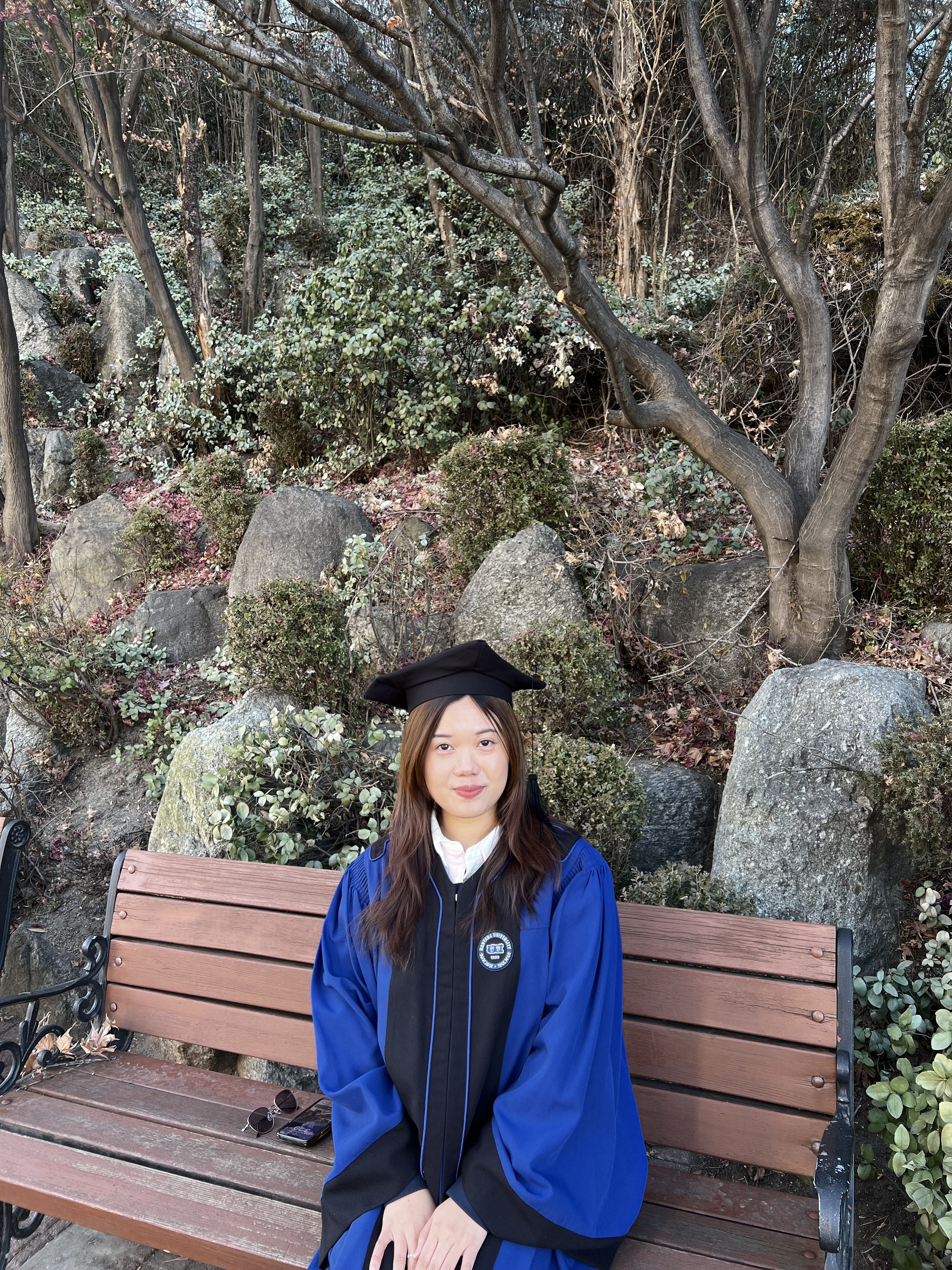 Dilia in graduation robes