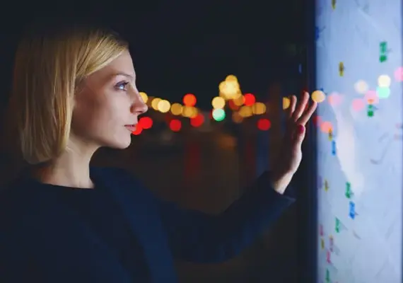 Student using an interactive LED screen.