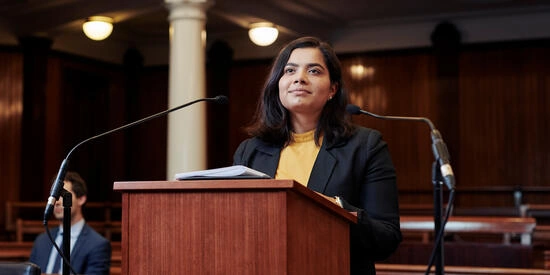 A Deakin law student in a courtroom.