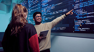 34749_320x180_students_analytics Students studying data analytics in a lab