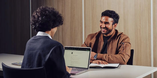 Two Deakin students studying in a classroom