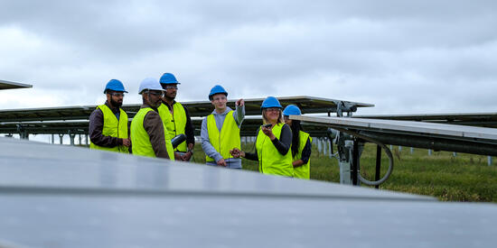 Construction workers standing at Deakin's microgrid site