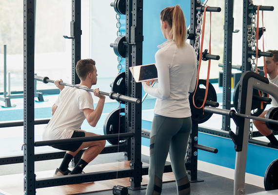 Deakin student weightlifting in a campus gym in the Deakin sport facilities. 